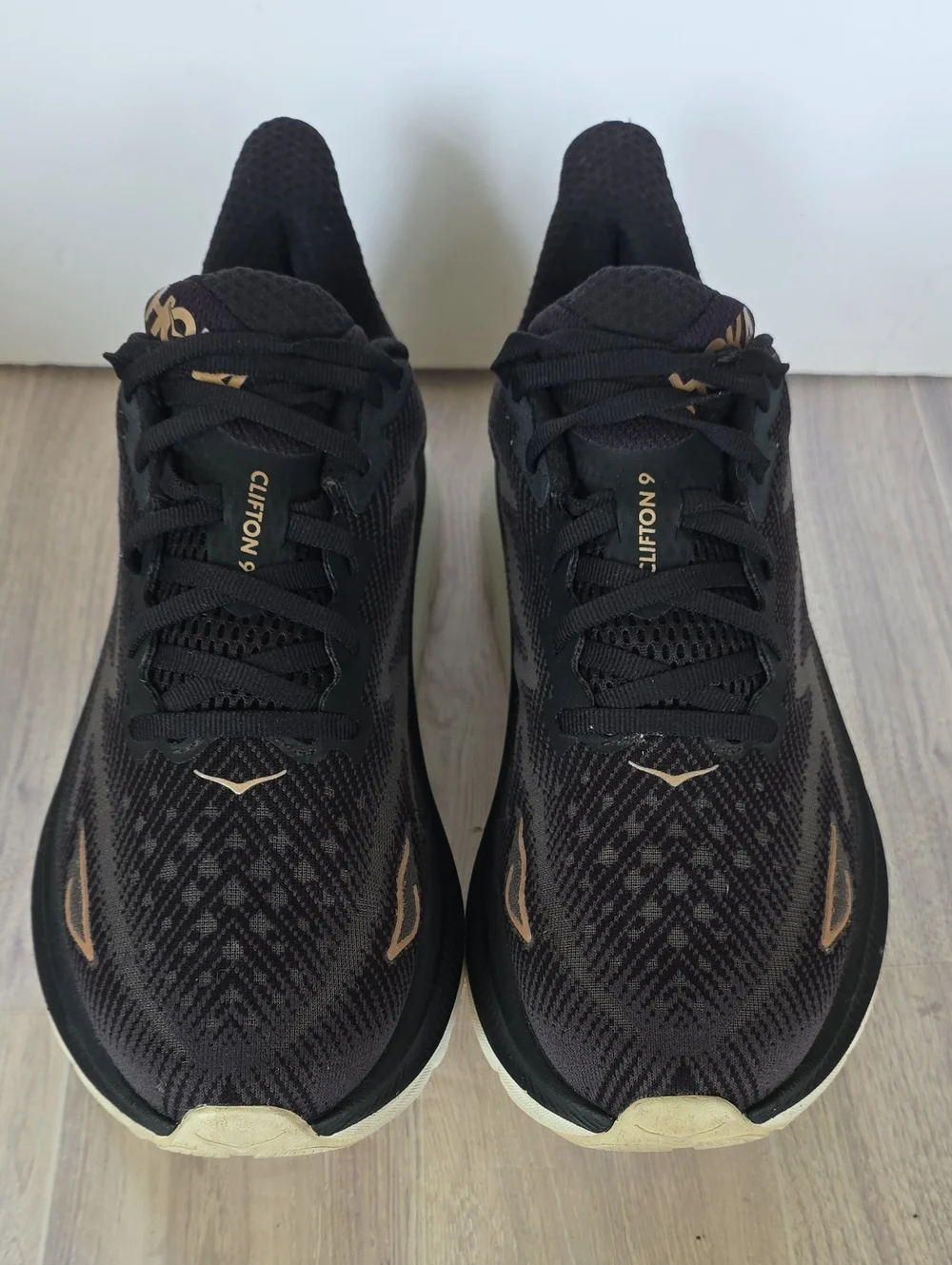 HOKA Women's Black Running Shoes with Rose Gold Logo